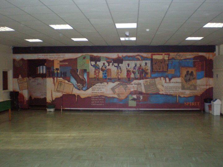 One of the many stunning murals in the old school building by Art Students!
